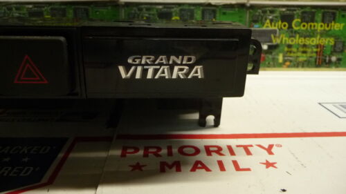 A204-15 OEM WARRANTY 1999-2003 SUZUKI VITARA CLOCK AND HAZARD CONTROL DASH